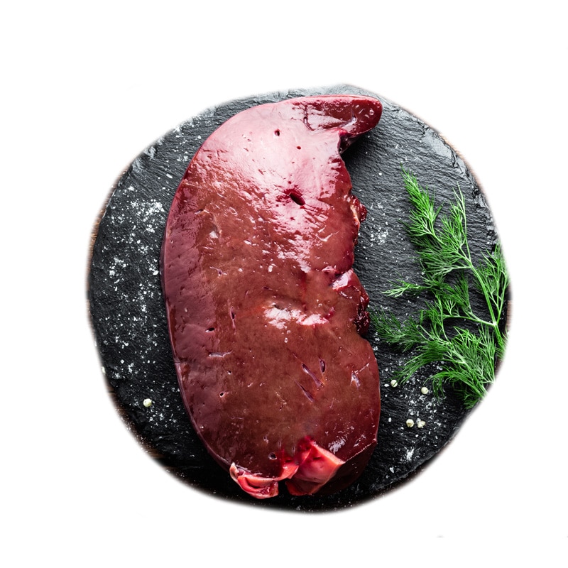 Raw liver on slate board on wooden background top view